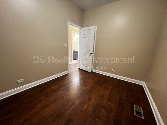 Building Photo - 7642 S Normal Ave