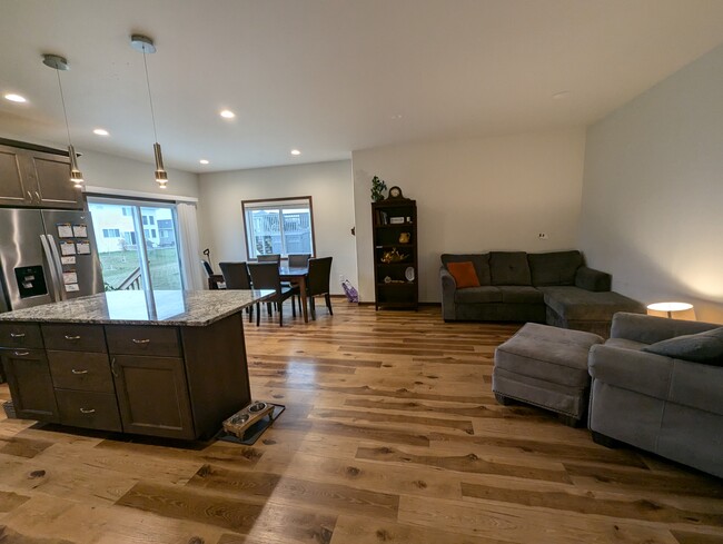 Warm colored hard floors and cubpoards - 5227 11th St W