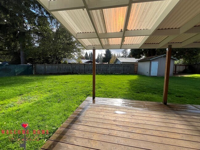 Building Photo - Beautiful Remodeled Rambler!!!  Come enjoy this HUGE backyard!!  NEW CARPET!!