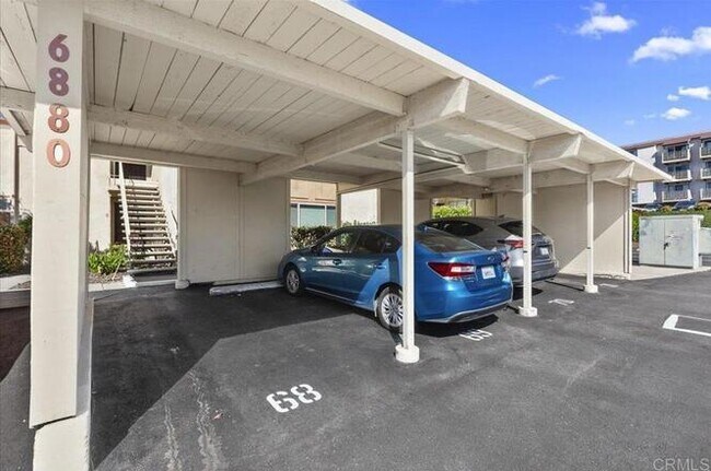 Building Photo - Poolside Living at Its Finest – Turnkey 3BR Condo with Direct Patio Access to the Pool