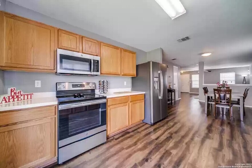 Building Photo - 6327 Wild Flower Way
