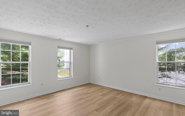 Building Photo - Welcome to Piney Orchard! This beautifully updated 2-bedroom, 2-bath condominium!