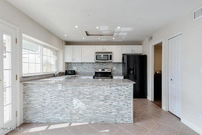 Building Photo - 4875 N Granite Reef Rd