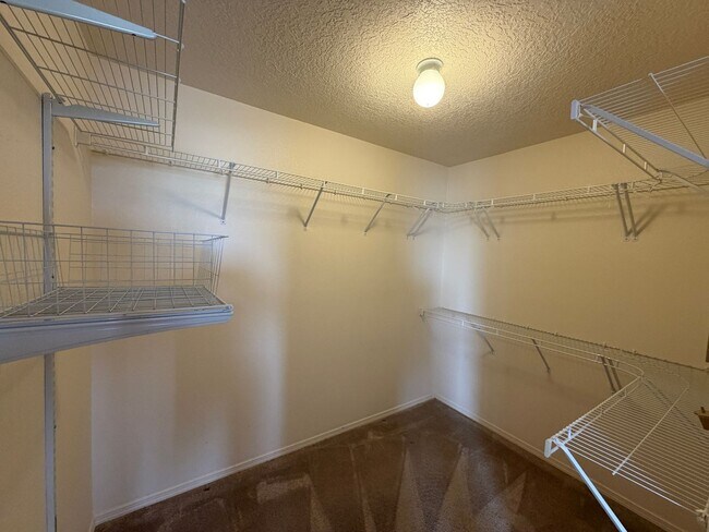 Building Photo - 4 Bedroom Home Available Near McMahon Blvd NW & Universe Blvd NW!