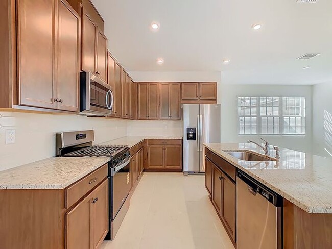 Building Photo - New Luxury Townhome in Celebration, FL Corner unit. All porcelain tiled floors. Aleutian model by...