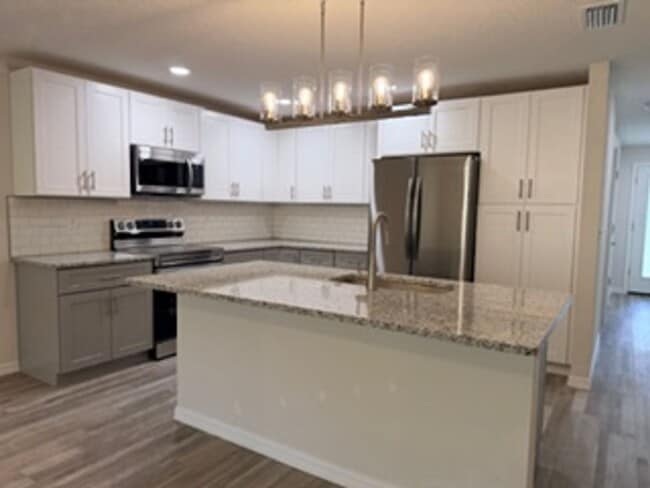 Building Photo - New Pine Lake Duplex