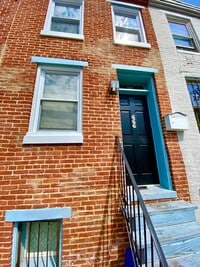 Building Photo - Charming 1BR with 1.5 Baths and Bonus Basement Room in the Heart of Ridgley’s Delight