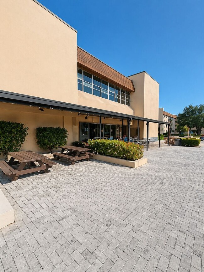 Building Photo - Welcome to Tampa Racquet Club – Where Comfort Meets Convenience!