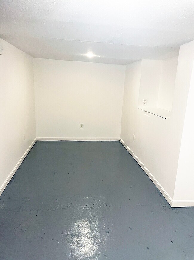 Spacious room in basement - 1107 Central Ave