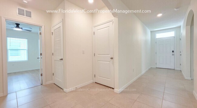 Building Photo - MOVE IN READY ! 4 BEDROOM/2 BATH! TILE- LVP THROUGHOUT! LAWN MOWING INCLUDED!