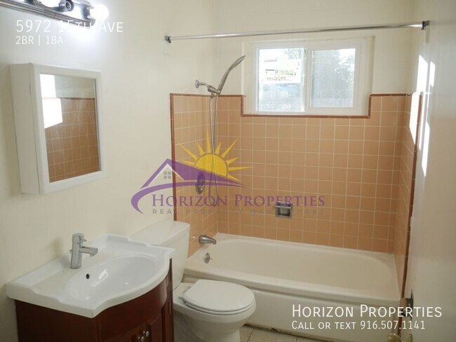 Building Photo - 5972 15th Ave