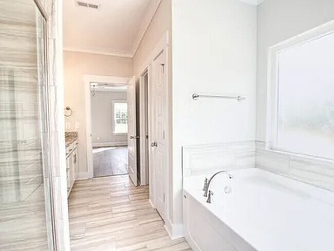 Building Photo - Situated on over 3 acres right in a growin...
