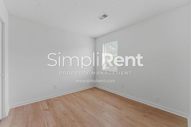 Building Photo - Updated Home with Spacious Layout & Private Backyard