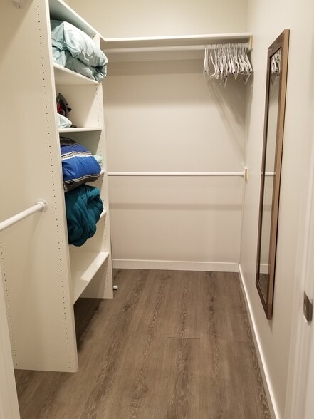 Walk-in closet. - 4449 S Slauson Ave