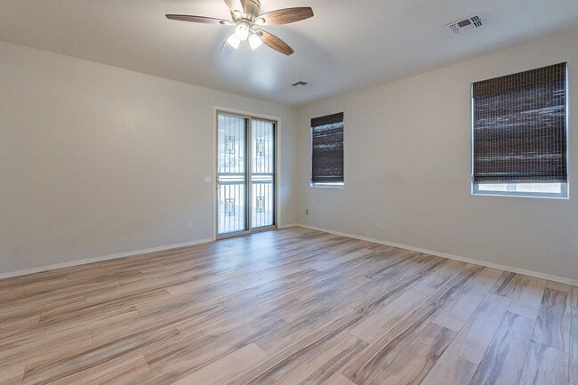 Building Photo - Four Bedrooms, 3 Car Garage - New flooring!