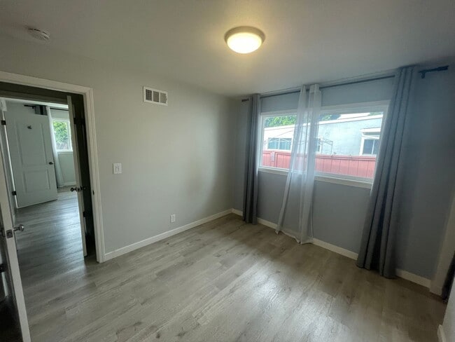 Building Photo - $3690 -- Charming, Centrally Located Singl...