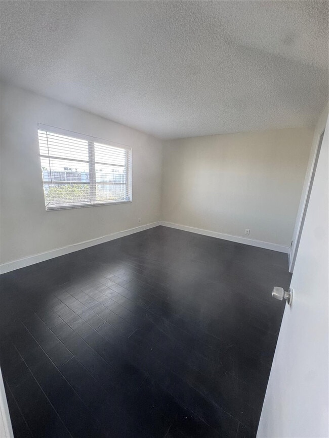 Building Photo - 8750 N Sherman Cir