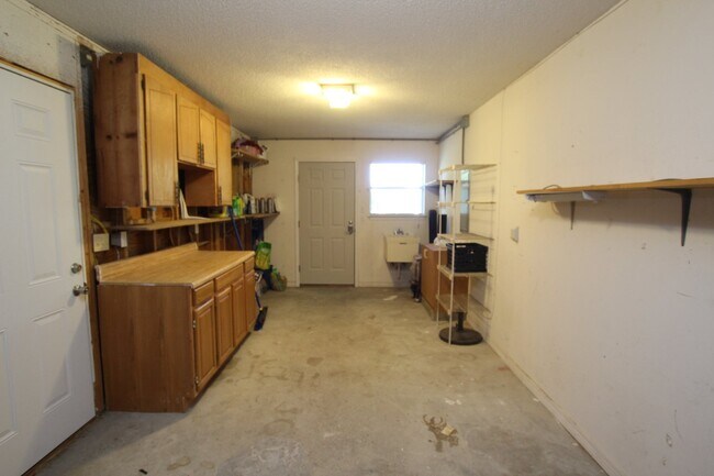 Building Photo - Live the Gulf Breeze Waterfront Life – Dock, Canal Access & Boat Lift!