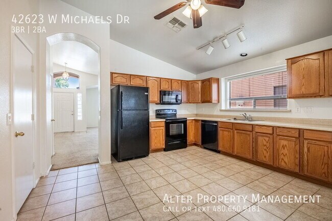 Building Photo - 42623 W Michaels Dr