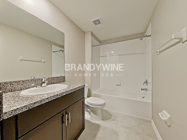 Building Photo - NEW LOWER RENTAL RATE LEASING SPECIAL: Rec...