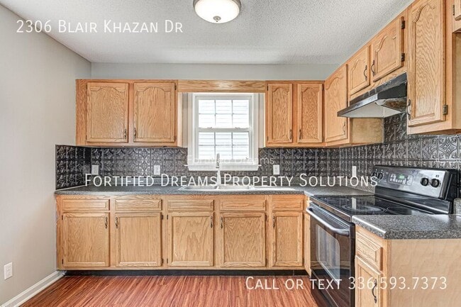 Building Photo - 2306 Blair-Khazan Dr
