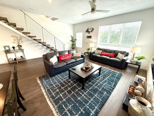 Building Photo - AVAILABLE NOW! Jaw Dropping 3 Story 3 Bedr...