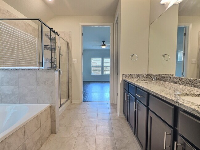 Building Photo - "Charming 3-Bed Oasis in San Antonio – Spa...