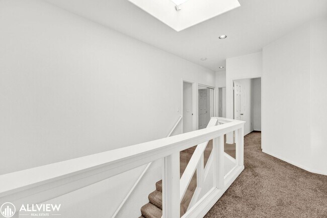 Building Photo - Spacious Coastal Condo with Rooftop Ocean ...