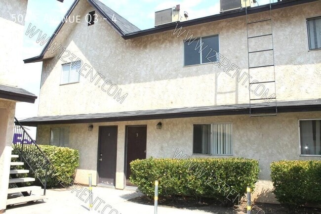 Building Photo - 504 E Ave Q3