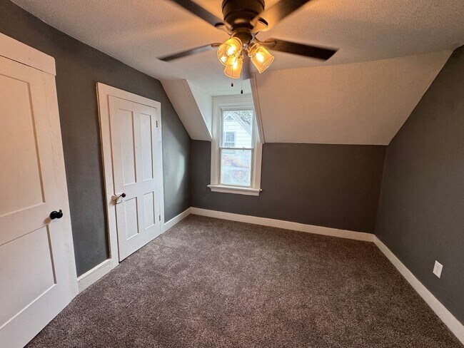 Building Photo - Spacious 4-Bedroom Home with Porch, Deck and Fenced Yard!
