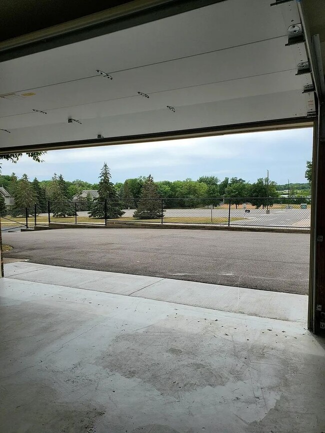 Building Photo - Two Bedroom Townhouse W/ Views Of Rice Lak...