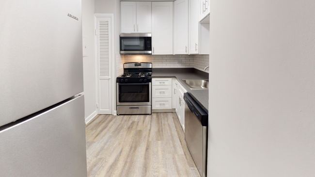 Modern shaker style cabinetry with chrome pulls - Alister Arlington Ridge