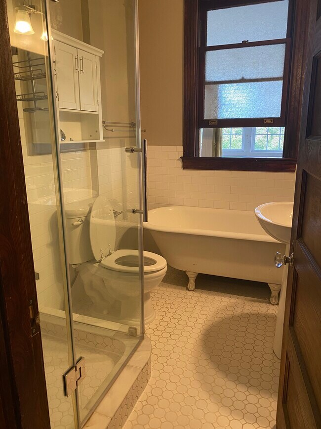 bathroom with tub and shower - 4206 New Hampshire Ave NW