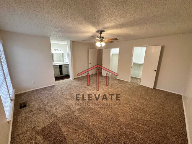 Building Photo - "Charming 3-Bedroom Townhouse Oasis with 2...