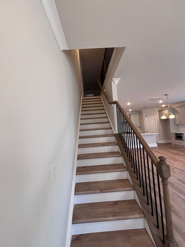 Building Photo - Brand new three-bedroom, 2.5-bath townhome