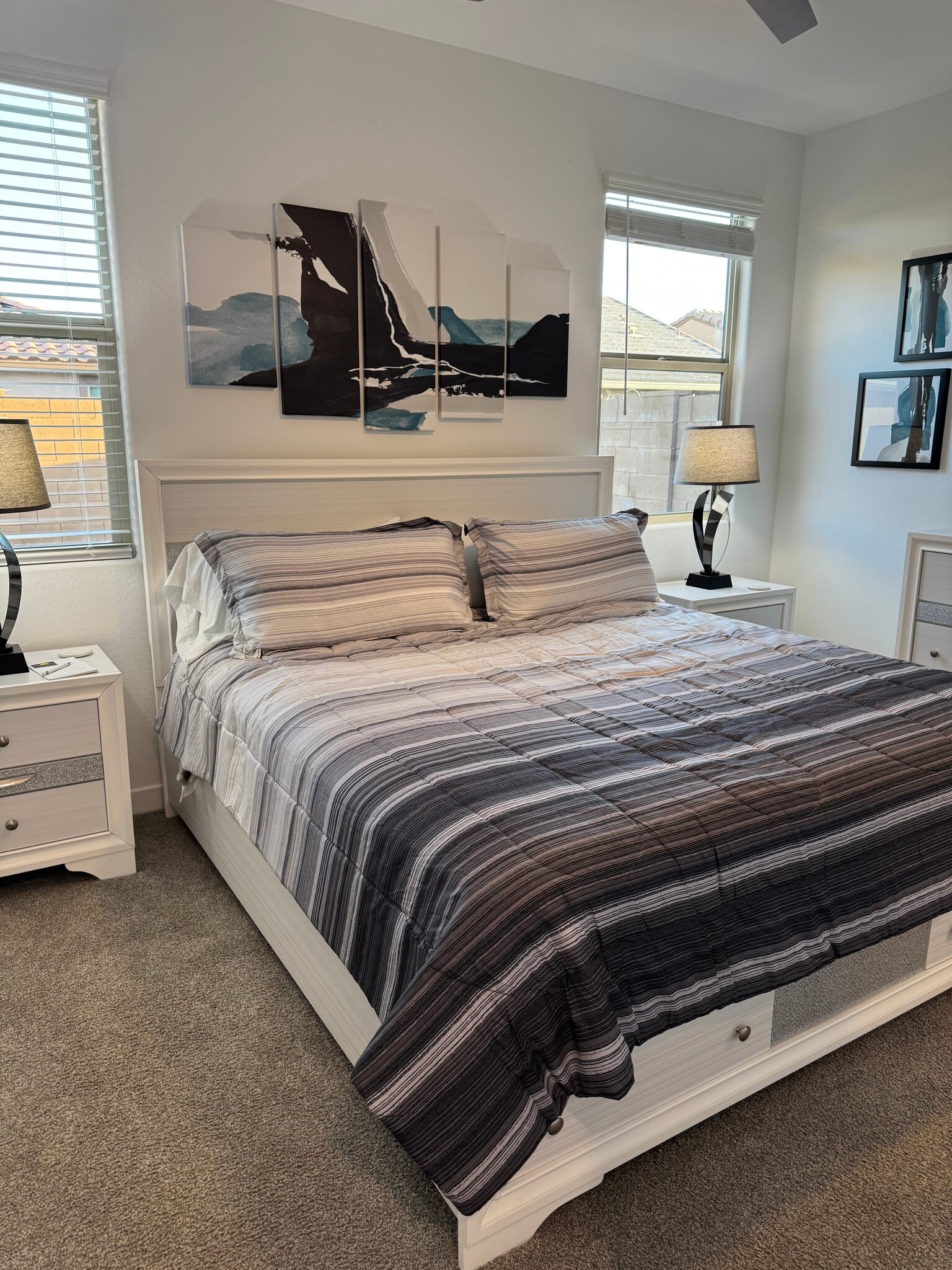Primary Bedroom- 65" smart tv and king sized bed - 8957 W Palo Verde Dr