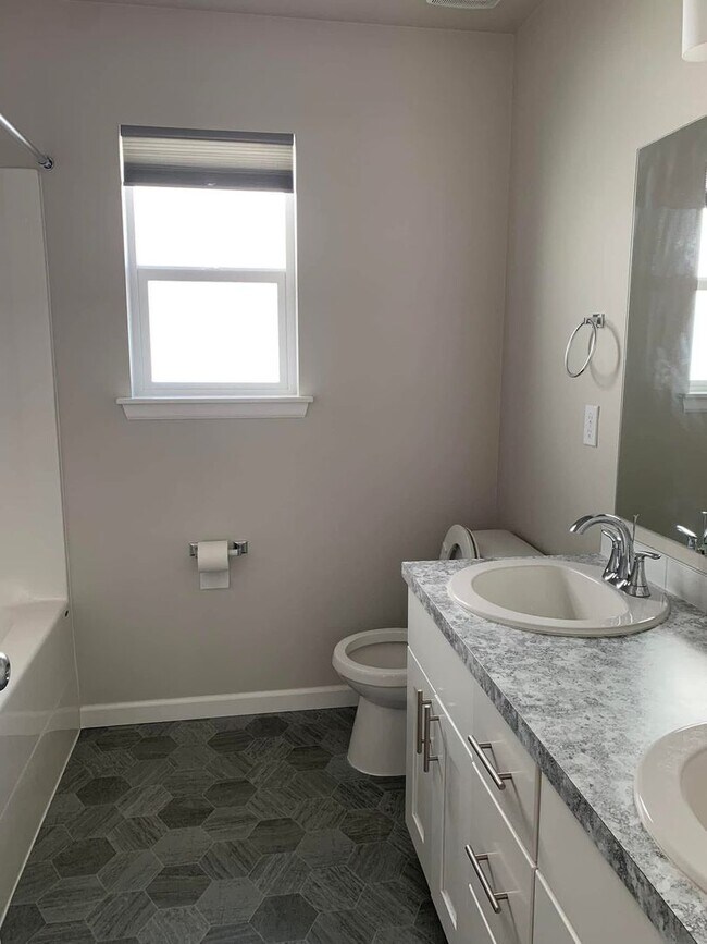 Building Photo - Spacious 4-Bedroom Corner Lot Home with Bonus Room, A/C & Updated Kitchen