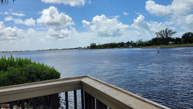 Building Photo - LEASE PENDING Annual/Seasonal turnkey furnished 2/2 end townhome in waterfront community by Siest...