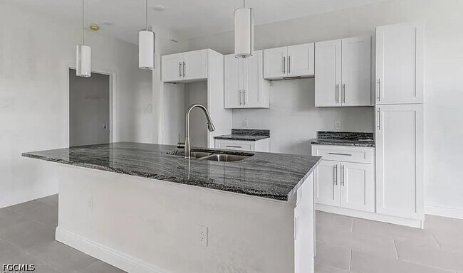 Building Photo - 408 Chiquita Blvd N