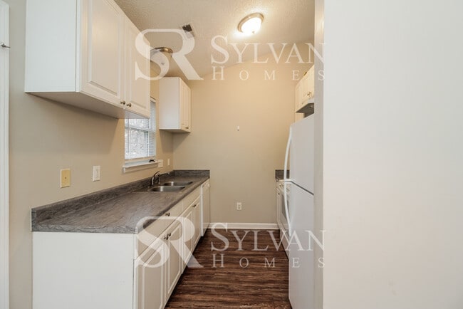 Building Photo - Lease today! No extra charge for contentme...