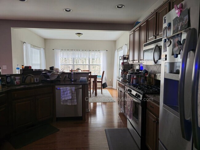 Building Photo - Modern Carlisle Rental with heated inground pool, fireplace, open floor plan, and finished basement