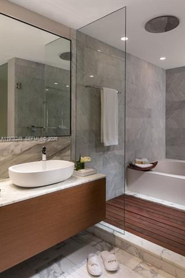 Building Photo - 10201 Collins Ave