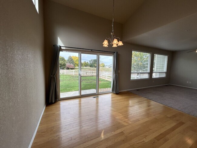 Building Photo - $500 Off First Month Of Rent! Modern 3BR Townhome with Fenced Yard & Garage