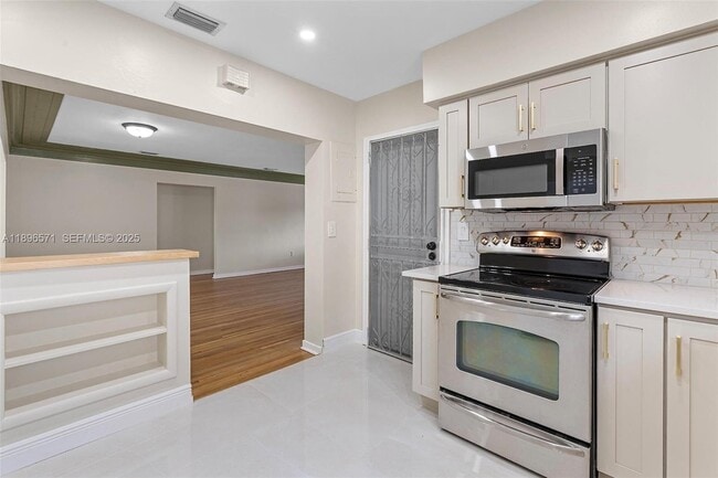 Building Photo - 1221 NW 34th Ave