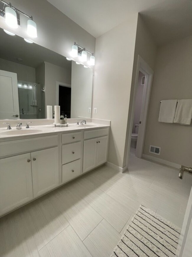 Building Photo - Modern 3BR Condo: Walk to Metro, 3 Miles f...