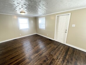 Building Photo - 4 bedroom HUGE attached, 2-car garage/workshop combo (has electricity