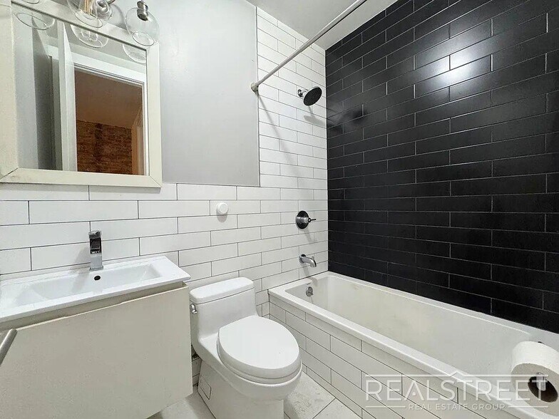 Building Photo - True 3 Bedroom layout — no flex, no railroad - Massive full-floor basement with second private entra