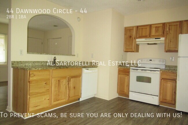 Building Photo - Pet Friendly Condo close to town and ready...