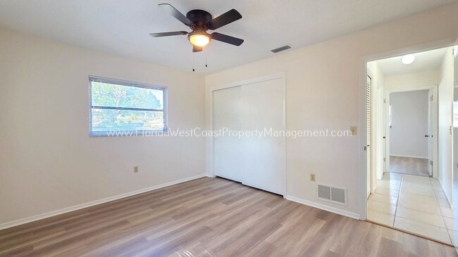Building Photo - SPACIOUS SARASOTA HOME WITH LARGE FENCED YARD! MOVE IN READY! ALL TILE/ NEW LVP!