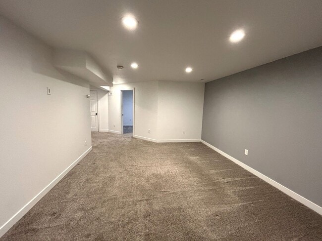 Building Photo - Spacious 5-Bedroom Home with Finished Basement and 3-Car Garage in Wellington